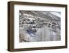 The red train runs across the snowy landscape around Samedan, Maloja, Canton of Graubunden, Engadin-Roberto Moiola-Framed Photographic Print