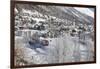 The red train runs across the snowy landscape around Samedan, Maloja, Canton of Graubunden, Engadin-Roberto Moiola-Framed Photographic Print