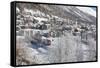 The red train runs across the snowy landscape around Samedan, Maloja, Canton of Graubunden, Engadin-Roberto Moiola-Framed Stretched Canvas