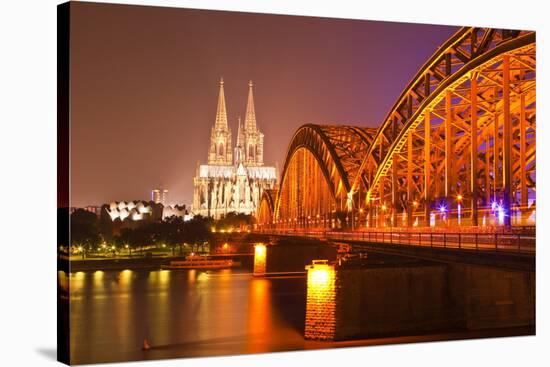 The River Rhine and Cologne Cathedral at Night, Cologne, North Rhine-Westphalia, Germany, Europe-Julian Elliott-Stretched Canvas