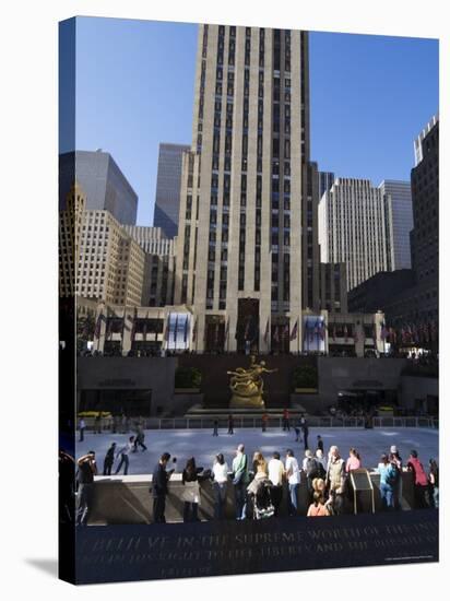 The Rockefeller Center with Ice Rink in the Plaza, Manhattan, New York City, USA-Amanda Hall-Stretched Canvas