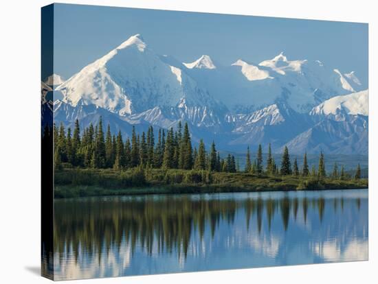 The Rugged Snow-Covered Peaks of the Alaska Range and Shore of Wonder Lake-Howard Newcomb-Stretched Canvas
