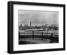 The S.S. Mauretania and New York City Skyline-null-Framed Photographic Print