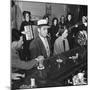 The Salvation Army Band Playing Musical Instruments and Singing in a Bar-Bernard Hoffman-Mounted Photographic Print