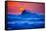 The setting sun and large winter waves breaking off the north coast of Kauai, Hawaii-Mark A Johnson-Framed Stretched Canvas