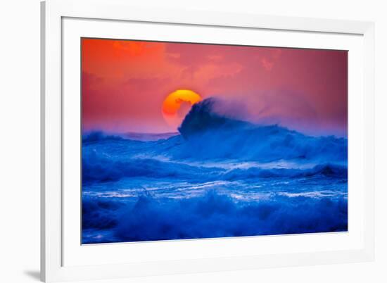 The setting sun and large winter waves breaking off the north coast of Kauai, Hawaii-Mark A Johnson-Framed Photographic Print