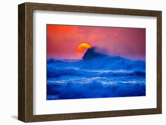 The setting sun and large winter waves breaking off the north coast of Kauai, Hawaii-Mark A Johnson-Framed Photographic Print