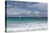 The Seychelles, La Digue, Anse Coco, Two Catamaran Yachtsmen-Catharina Lux-Stretched Canvas