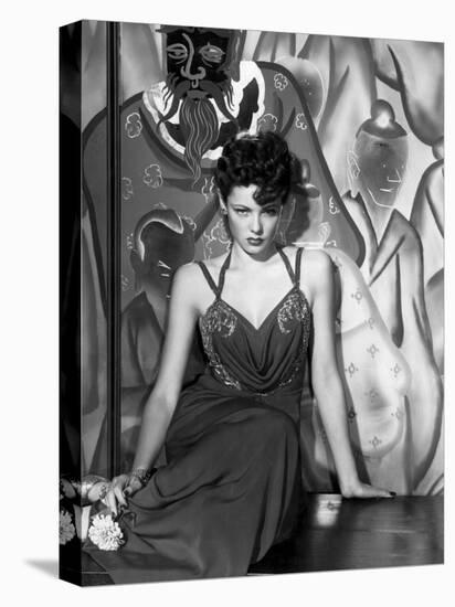 The Shanghai Gesture, Gene Tierney Wearing a Costume Designed by Oleg Cassini, 1941-null-Stretched Canvas