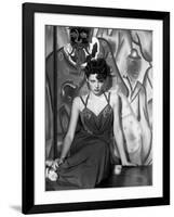 The Shanghai Gesture, Gene Tierney Wearing a Costume Designed by Oleg Cassini, 1941-null-Framed Photo