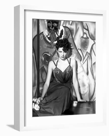 The Shanghai Gesture, Gene Tierney (Wearing a Costume Designed by Oleg Cassini), 1941-null-Framed Photo