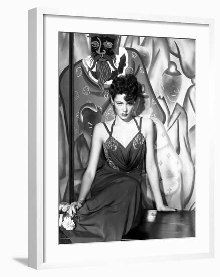 The Shanghai Gesture, Gene Tierney (Wearing a Costume Designed by Oleg Cassini), 1941-null-Framed Photo