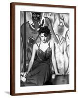 The Shanghai Gesture, Gene Tierney (Wearing a Costume Designed by Oleg Cassini), 1941-null-Framed Photo