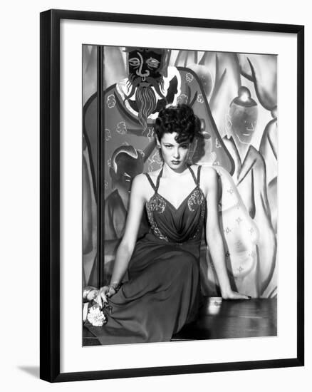 The Shanghai Gesture, Gene Tierney (Wearing a Costume Designed by Oleg Cassini), 1941-null-Framed Photo