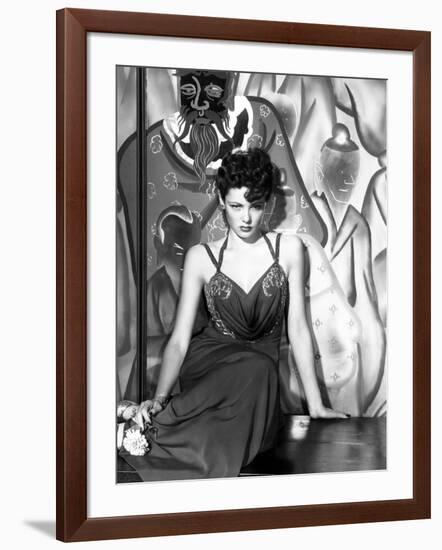 The Shanghai Gesture, Gene Tierney (Wearing a Costume Designed by Oleg Cassini), 1941-null-Framed Photo