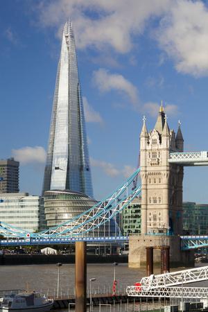 https://imgc.allpostersimages.com/img/posters/the-shard-and-tower-bridge-london-england-united-kingdom-europe_u-L-PNPO400.jpg?artPerspective=n