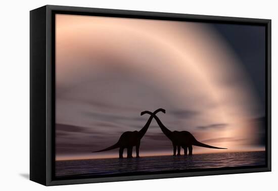 The Silhouetted Forms of a Pair of Courting Sauropod Dinosaurs-null-Framed Stretched Canvas