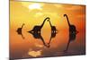 The Silhouetted Shapes of Sauropod Dinosaurs at the Start of a Prehistoric Day-Stocktrek Images-Mounted Art Print