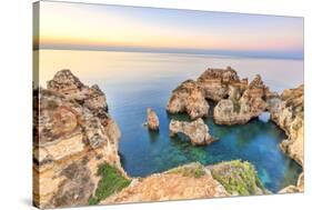 The sky turns pink at dawn on Ponta da Piedade Lagos Algarve Portugal Europe-ClickAlps-Stretched Canvas