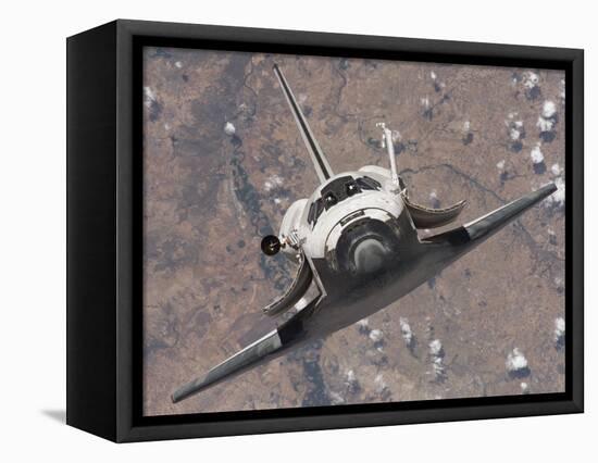 The Space Shuttle Discovery Approaches the International Space Station for Docking-Stocktrek Images-Framed Stretched Canvas