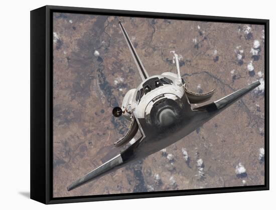 The Space Shuttle Discovery Approaches the International Space Station for Docking-Stocktrek Images-Framed Stretched Canvas