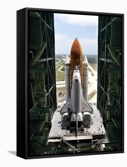 The Space Shuttle Discovery Begins Its Six Hour Trek from the Vehicle Assembly Building-null-Framed Stretched Canvas