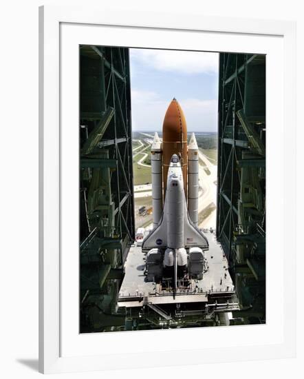 The Space Shuttle Discovery Begins Its Six Hour Trek from the Vehicle Assembly Building-null-Framed Photographic Print