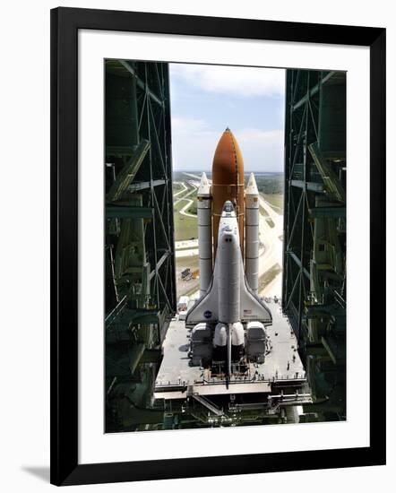 The Space Shuttle Discovery Begins Its Six Hour Trek from the Vehicle Assembly Building-null-Framed Photographic Print