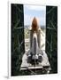 The Space Shuttle Discovery Begins Its Six Hour Trek from the Vehicle Assembly Building-null-Framed Photographic Print