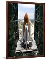 The Space Shuttle Discovery Begins Its Six Hour Trek from the Vehicle Assembly Building-null-Framed Photographic Print