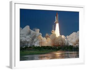 The Space Shuttle Discovery Rises from the Swamps Surrounding its Pad at Kennedy Space Center-null-Framed Photographic Print