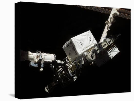 The Space Shuttle Endeavour's Remote Manipulator System (RMS) Robotic Arm August 14, 2007-Stocktrek Images-Stretched Canvas