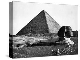 The Sphinx and the Pyramid of Cheops Standing in the Desert-null-Stretched Canvas