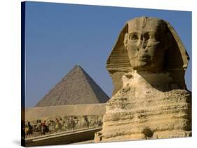 The Sphinx with 4th Dynasty Pharaoh Menkaure's Pyramid, Giza, Egypt-Kenneth Garrett-Stretched Canvas