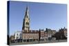 The Spire of St. Mary Magdalene Church Rises over Building on the Market Square-Stuart Forster-Stretched Canvas