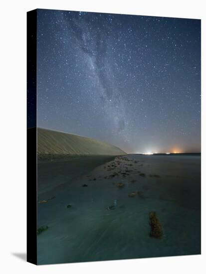 The Stars and Milky Way over the Dunes in Jericoacoara, Brazil-Alex Saberi-Stretched Canvas