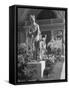 The Statue of Aphrodite and Eros in Louvre Museum During a Flower Show-Dmitri Kessel-Framed Stretched Canvas