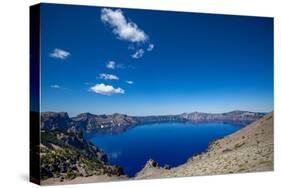 The still waters of Crater Lake, the deepest lake in the U.S.A., part of the Cascade Range, Oregon,-Martin Child-Stretched Canvas