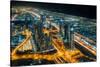 The street lights and skyscrapers of Dubai from high above the city, Dubai, United Arab Emirates-Logan Brown-Stretched Canvas
