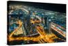 The street lights and skyscrapers of Dubai from high above the city, Dubai, United Arab Emirates-Logan Brown-Stretched Canvas