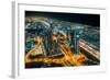 The street lights and skyscrapers of Dubai from high above the city, Dubai, United Arab Emirates-Logan Brown-Framed Photographic Print