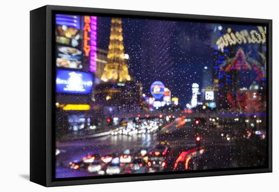 The Strip with Paris at Las Vegas main strip lights at night.-Michele Niles-Framed Stretched Canvas