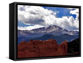 The Sun Breaks Through the Clouds to Highlight the Summit of Pikes Peak-null-Framed Stretched Canvas
