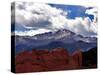 The Sun Breaks Through the Clouds to Highlight the Summit of Pikes Peak-null-Stretched Canvas