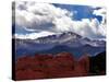 The Sun Breaks Through the Clouds to Highlight the Summit of Pikes Peak-null-Stretched Canvas