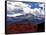 The Sun Breaks Through the Clouds to Highlight the Summit of Pikes Peak-null-Framed Stretched Canvas