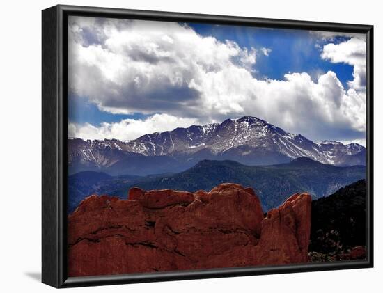 The Sun Breaks Through the Clouds to Highlight the Summit of Pikes Peak-null-Framed Photographic Print