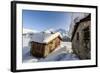 The Sun, Covered with Thin Clouds, Illuminating a Typical Hut Covered with Snow at the Maloja Pass-Roberto Moiola-Framed Photographic Print