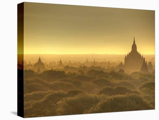 The Sun Rises across the 2000+ Temples and Pagodas at Bagan in the Country of Burma (Myanmar)-Kyle Hammons-Stretched Canvas