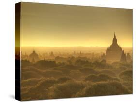 The Sun Rises across the 2000+ Temples and Pagodas at Bagan in the Country of Burma (Myanmar)-Kyle Hammons-Stretched Canvas